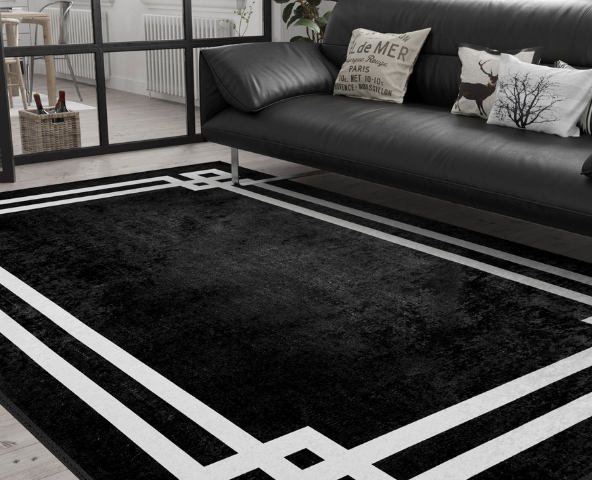 Black rugs work great with a black sofa