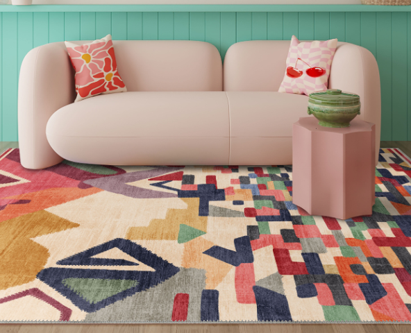 Colourful rug and a sofa