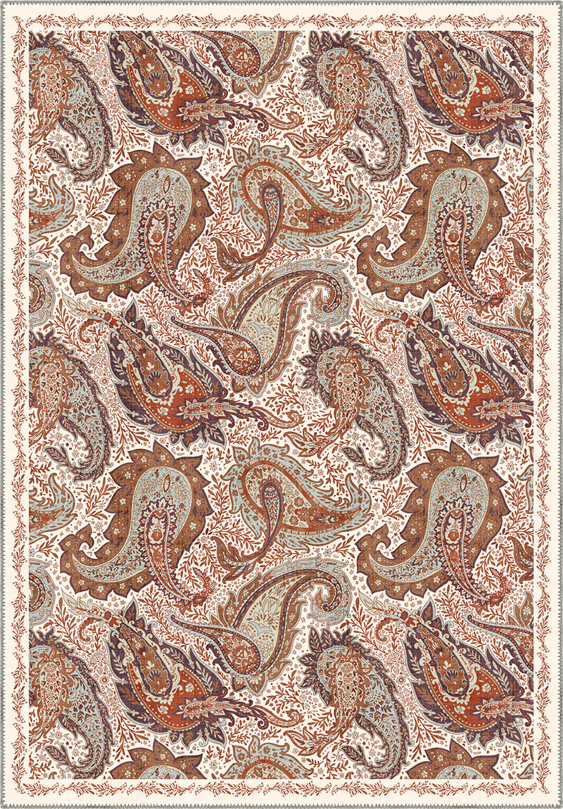 Brown paisley rug on a cream background.