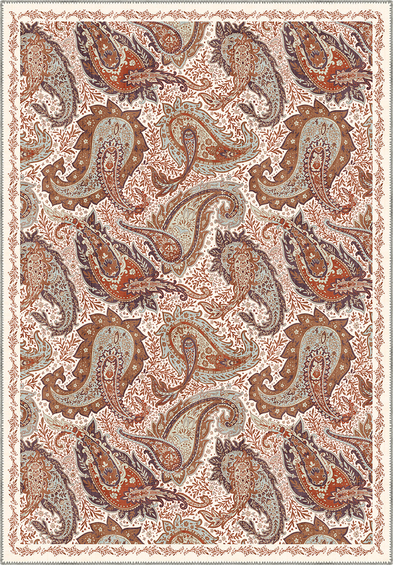 Brown paisley rug on a cream background.