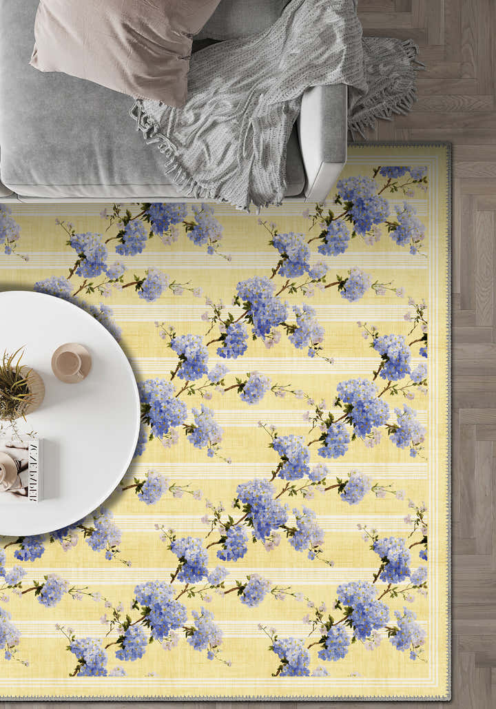 Yellow and lavender floral rug for living room.